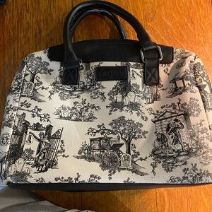 Retired Haunted mansion purse from Disney parks